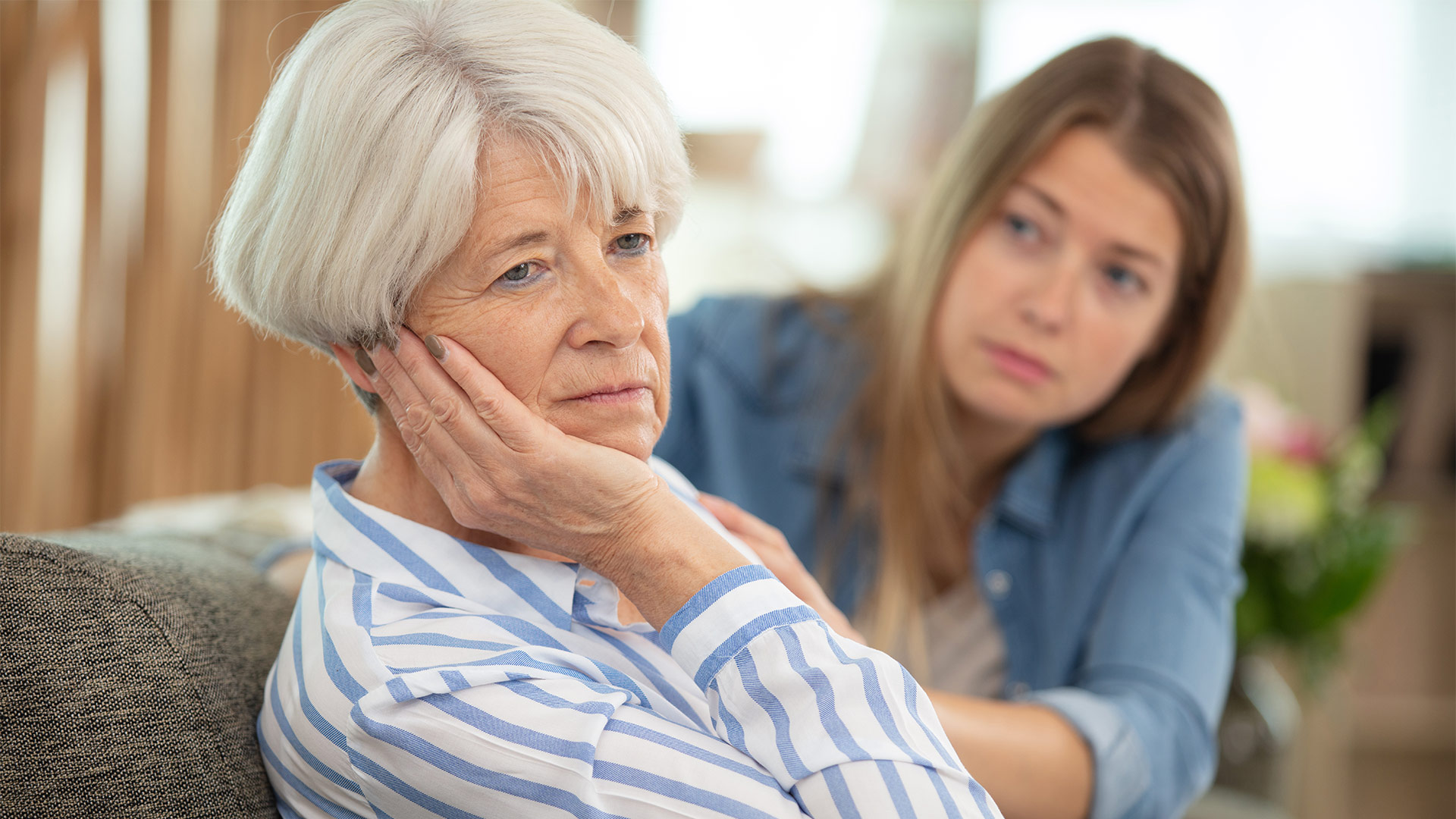 Woman with concerned daughter